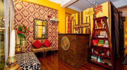Elegant interior of Siam Princess Thai Massage - Dymocks Building, Sydney, New South Wales, AU, with warm decor.
