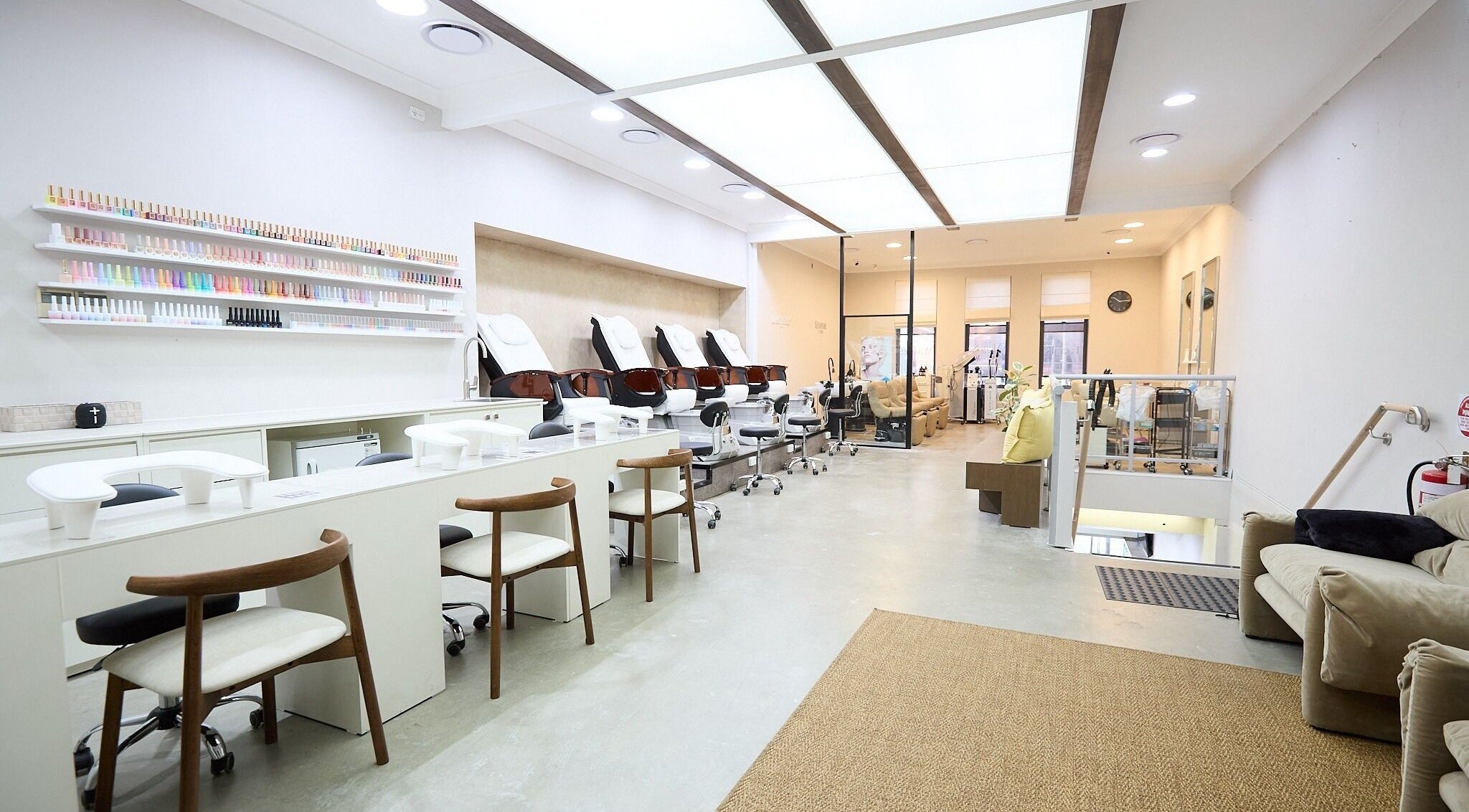 Elegant interior of Kim Sun Young Nail & Clinic Haymarket, Haymarket, New South Wales, AU, showcasing manicure stations.