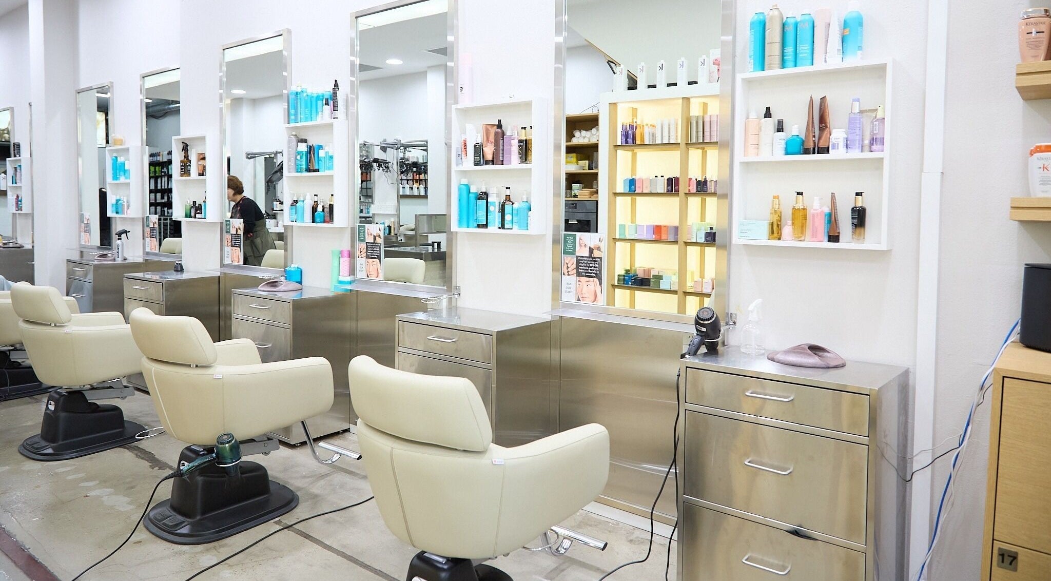 Modern salon interior at Kim Sun Young Hair Haymarket, Haymarket, New South Wales, AU, featuring stylish chairs and mirrors.
