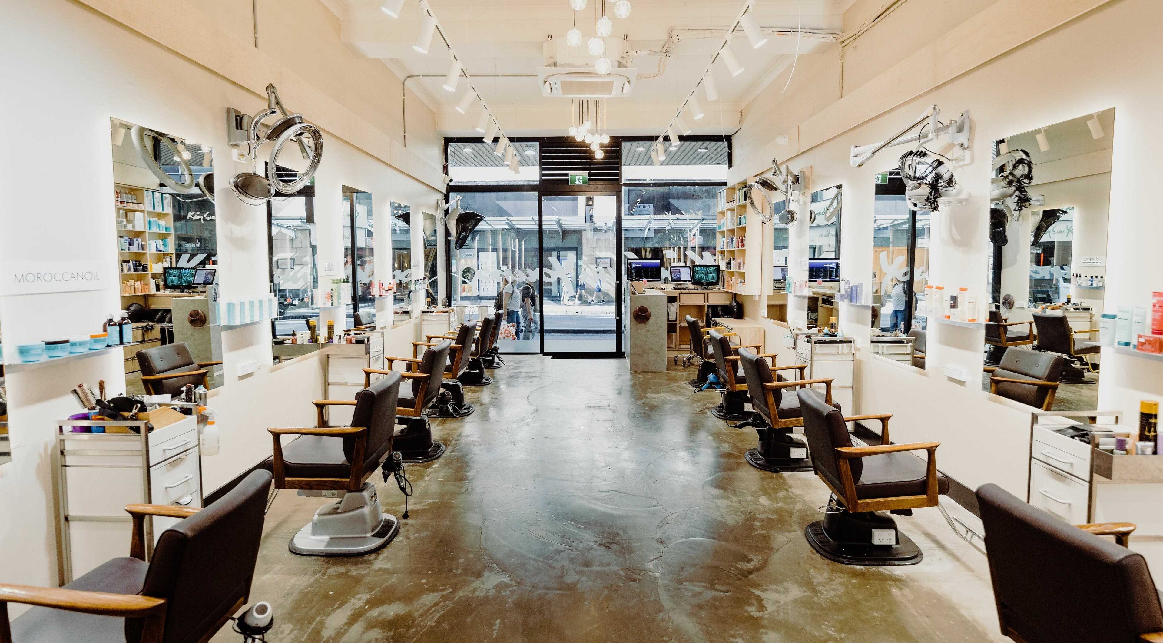 Spacious interior of Kim Sun Young Hair Liverpool St, Sydney, New South Wales, AU with modern styling chairs.