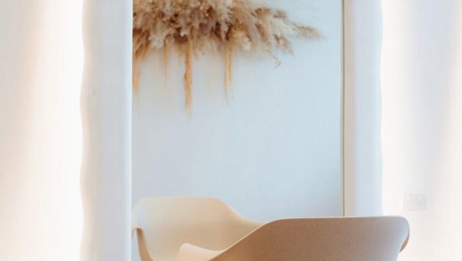 Minimalist beauty chair at Hair With Sam x, Bella Vista, New South Wales, AU, offering a tranquil salon experience.