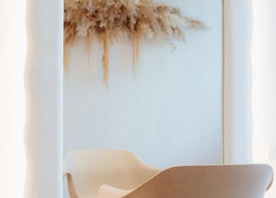 Minimalist beauty chair at Hair With Sam x, Bella Vista, New South Wales, AU, offering a tranquil salon experience.