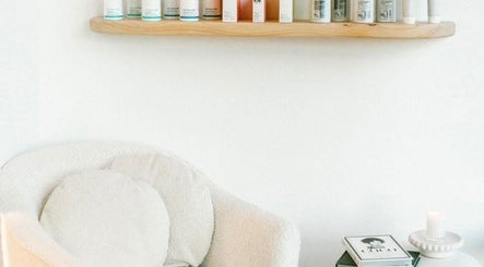 Relaxing chair and skincare shelf at Hair With Sam x, Bella Vista, New South Wales, AU.