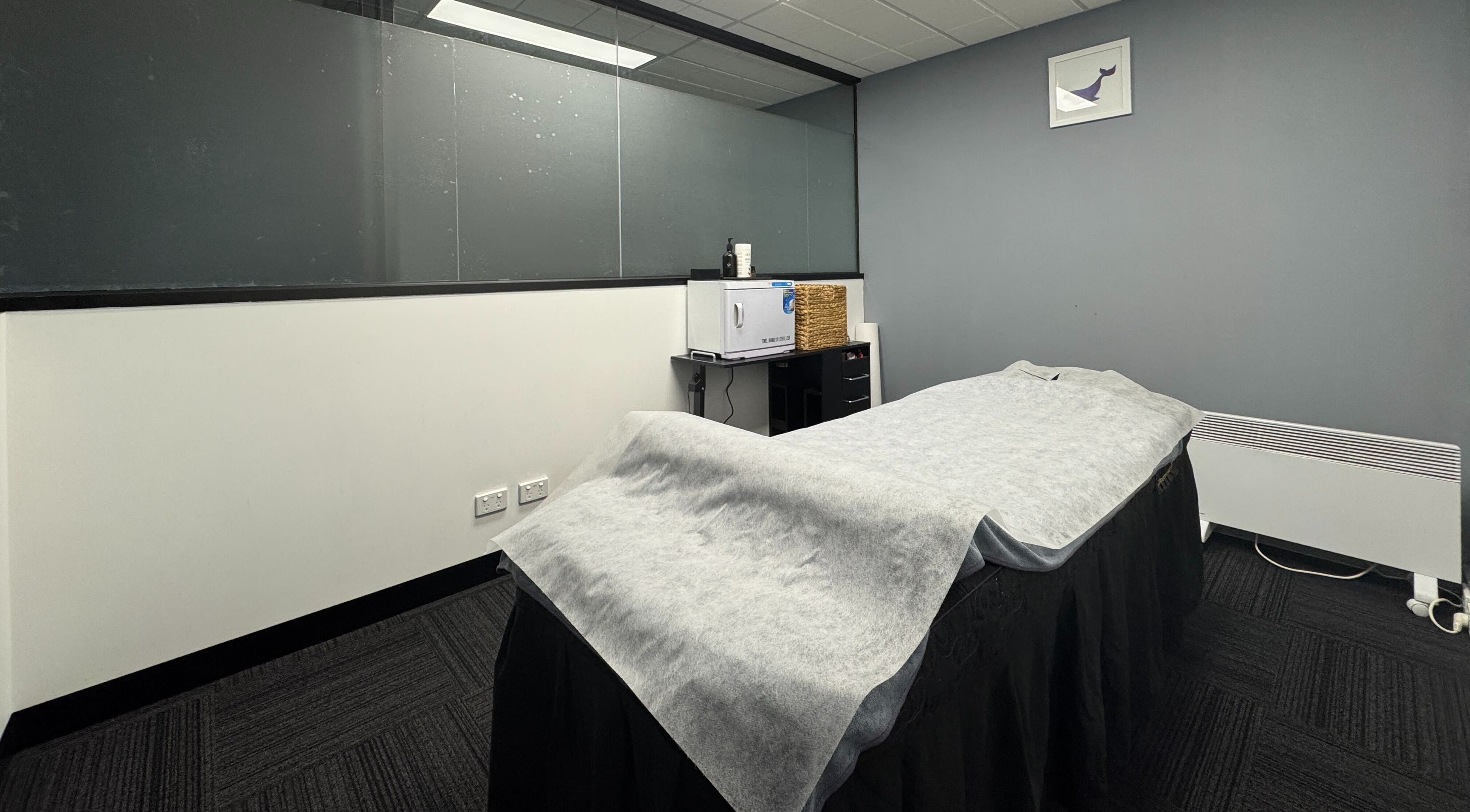 Relaxing wellness room at Body Go Clinic, Melbourne, Victoria, AU featuring a treatment bed and soothing decor.