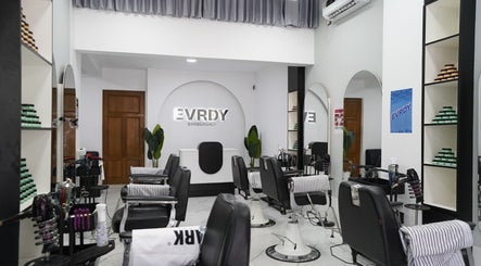 Modern interior of EVRDY Barbershop - San Chaung, located in Yangon, Yangon Region, MM, featuring sleek barber chairs.