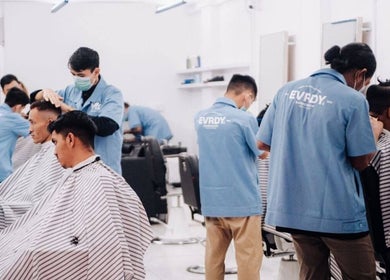 Professional barbers styling clients at EVRDY Barbershop - San Chaung, Yangon, Yangon Region, MM.