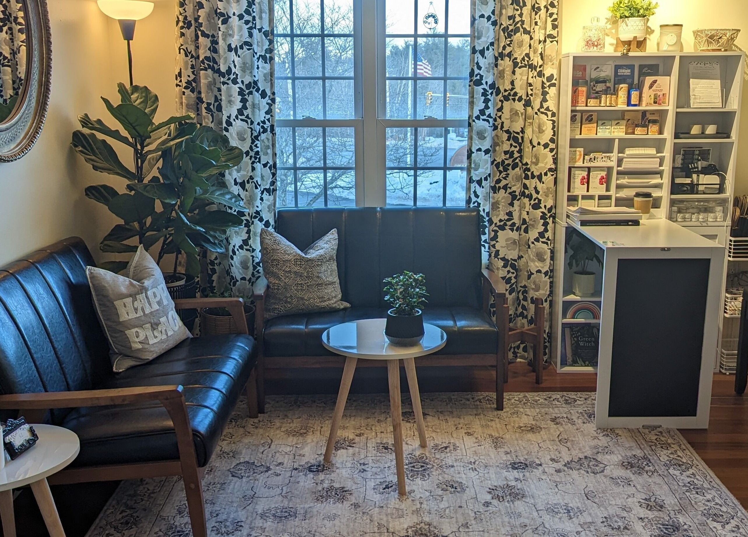Inviting seating area at S.L. Skin Studio in Hampstead, New Hampshire, US with modern decor.