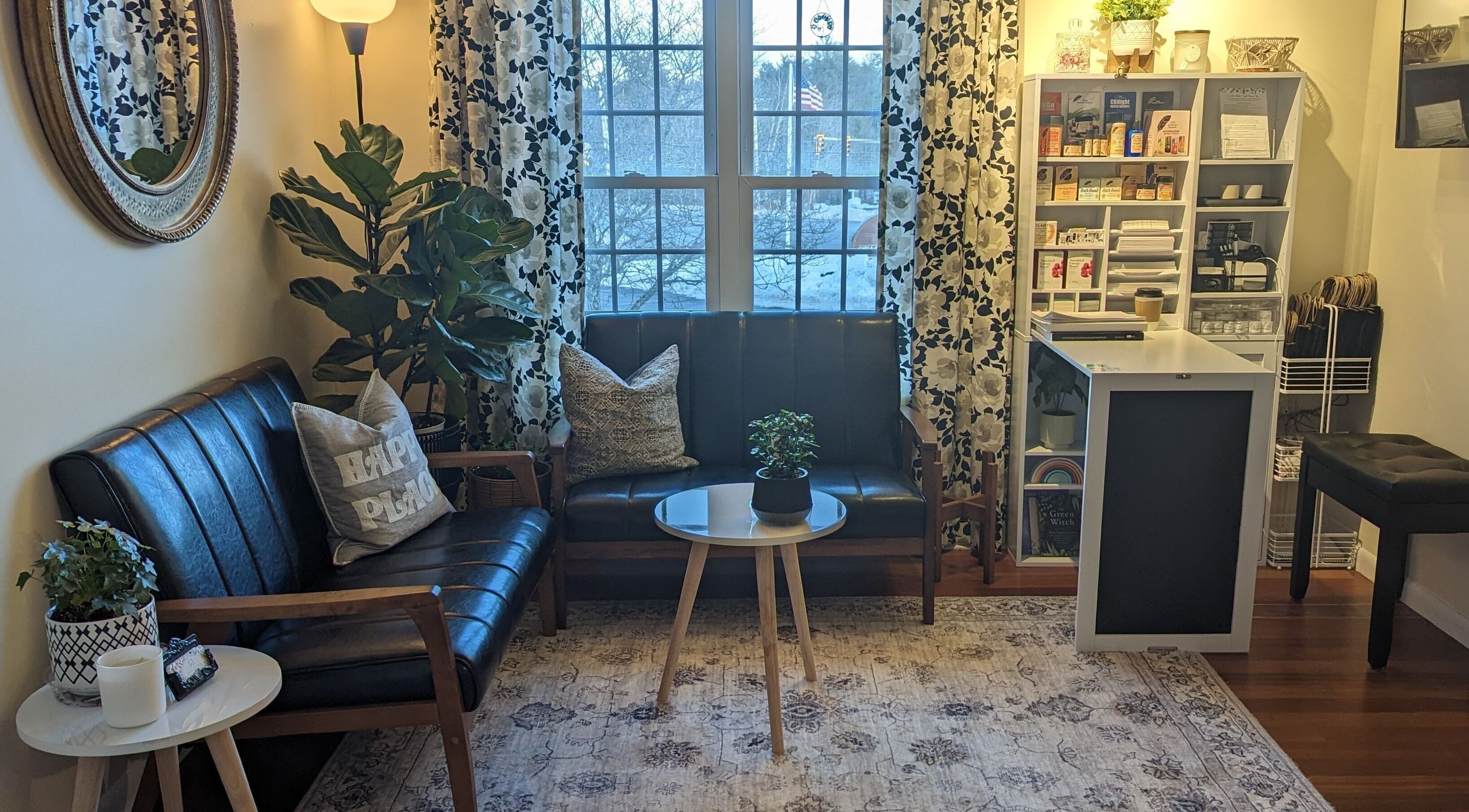 Inviting seating area at S.L. Skin Studio in Hampstead, New Hampshire, US with modern decor.