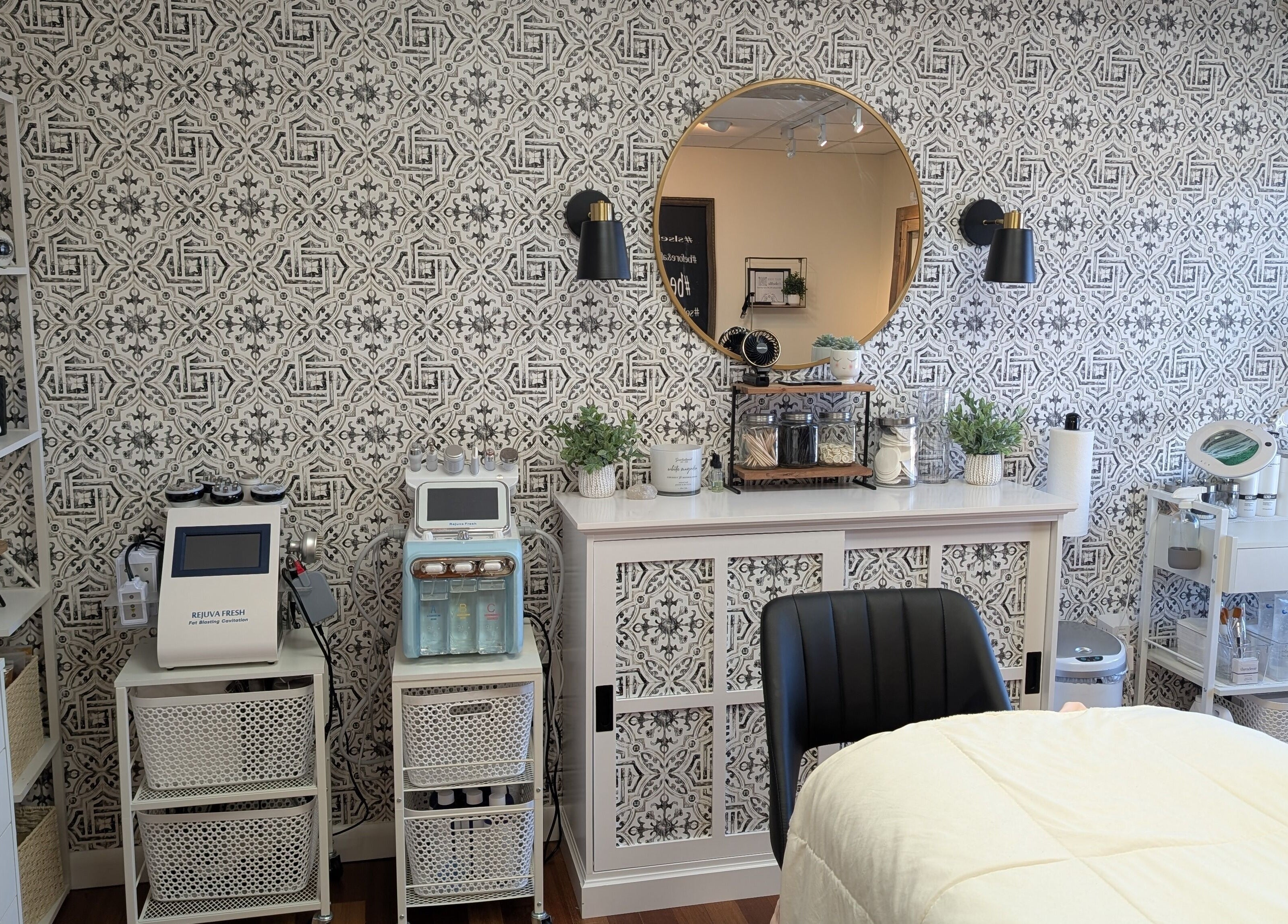 Elegant interior of S.L. Skin Studio in Hampstead, New Hampshire, US with stylish decor and advanced skincare tools.