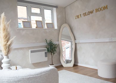 Elegant interior of The Glow Room Brackley, Brackley, England, GB with neutral decor and cozy seating.