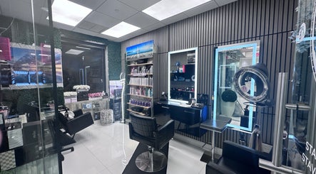 Stylish beauty studio interior at StavGhair in Parkland, Florida, US with modern decor and hair styling stations.
