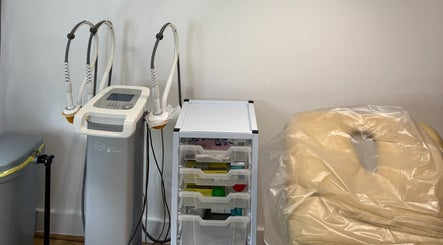 Modern beauty equipment and comfy chair at NUYU Body Aesthetics, Beckenham, England, GB.