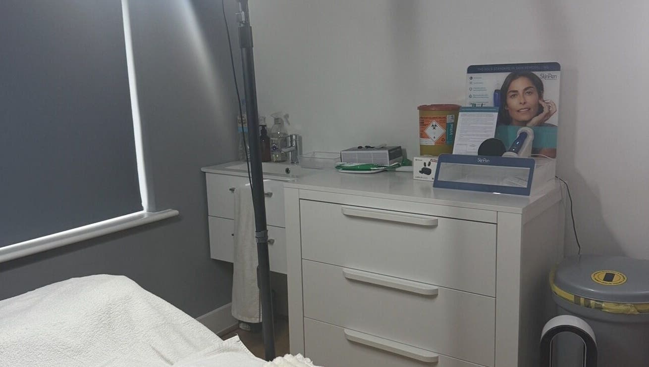 Equipment and storage at NUYU Body Aesthetics in Beckenham, England, GB. Clean, calming treatment room.