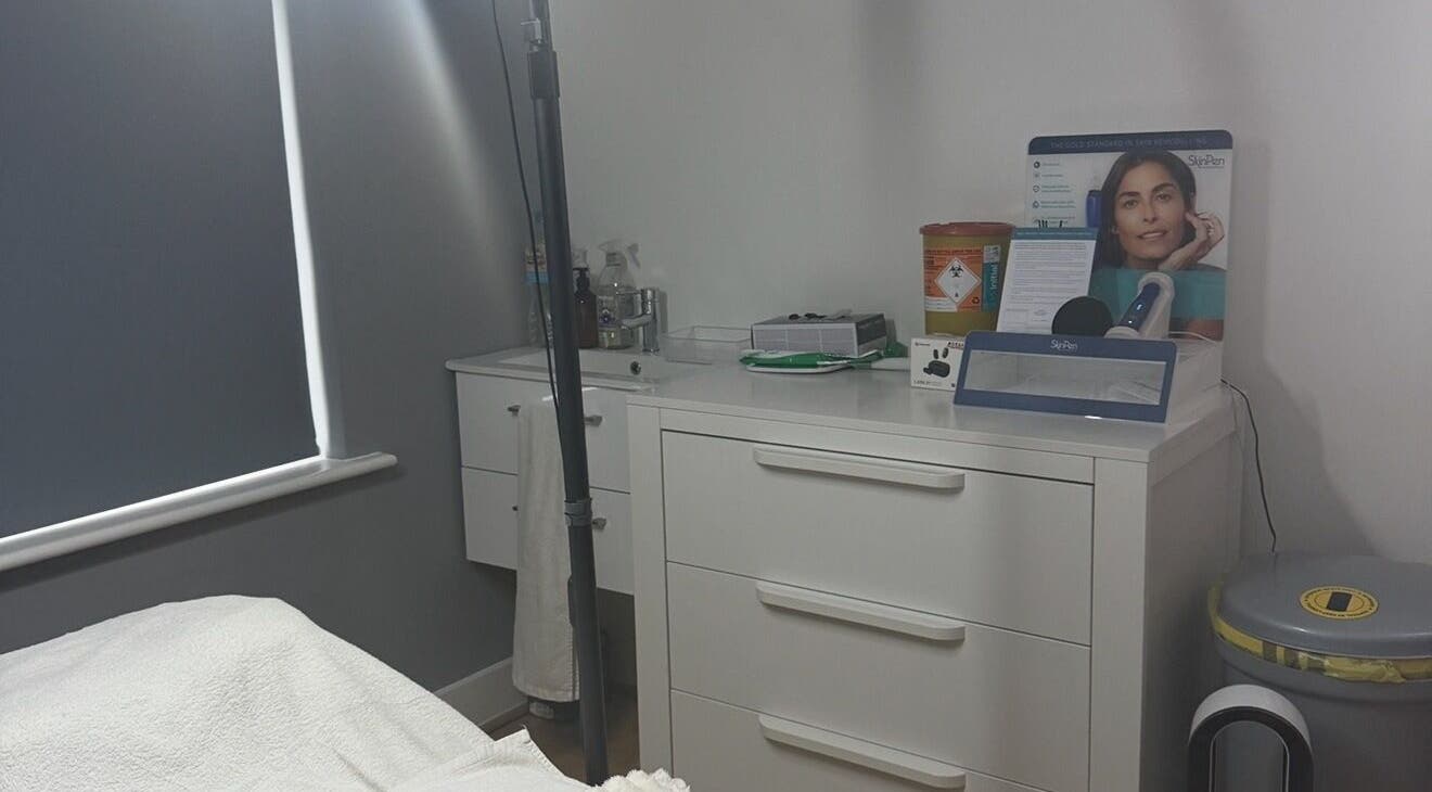 Equipment and storage at NUYU Body Aesthetics in Beckenham, England, GB. Clean, calming treatment room.