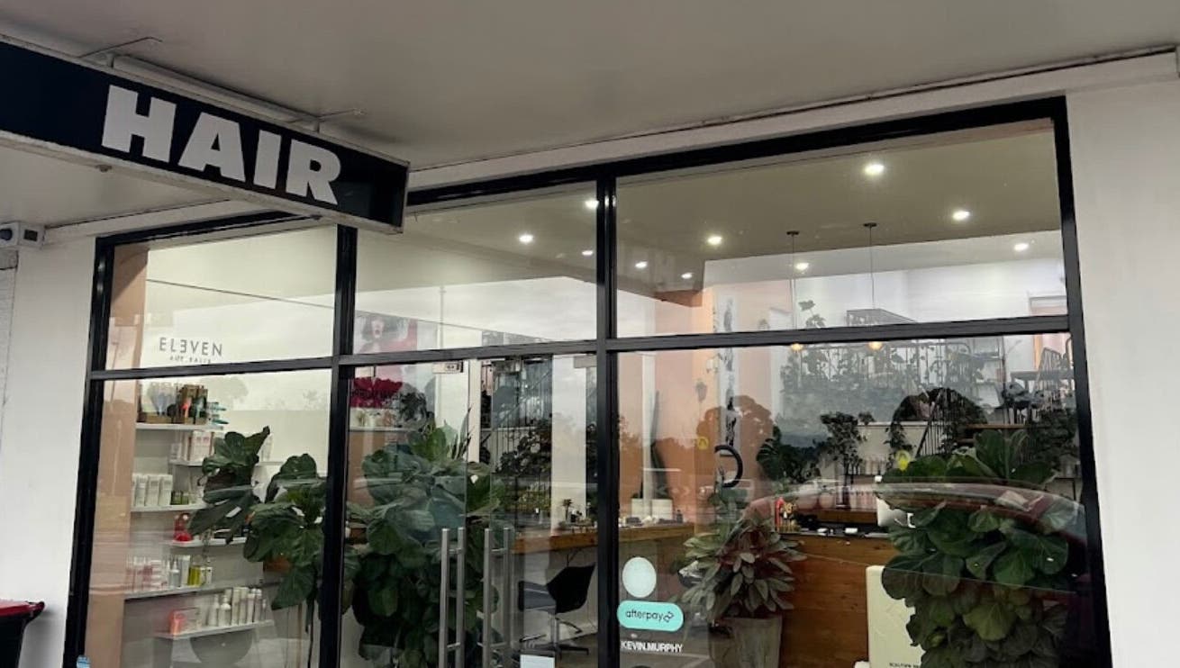 Front view of Beauty On Boulevard, chic hair salon in Melbourne, Victoria, AU with modern glass facade.