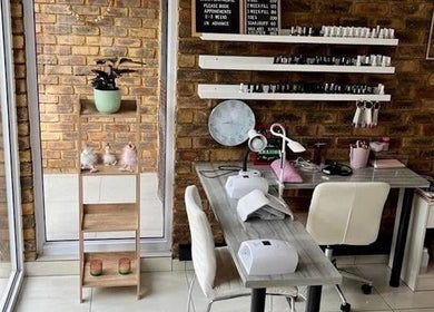 Modern nail station at Beauty Bliss ZA in Pretoria, Gauteng, ZA, showcasing sleek design and bright ambiance.