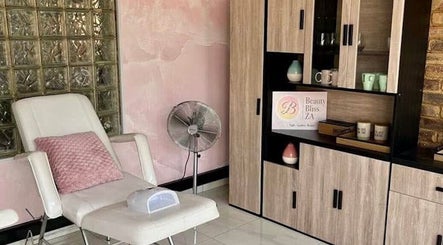 Relaxing beauty room at Beauty Bliss ZA in Pretoria, Gauteng, ZA, featuring a comfy chair and elegant decor.