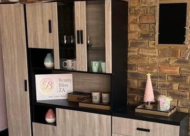 Modern wooden cabinet at Beauty Bliss ZA, Pretoria, Gauteng, ZA showcasing stylish decor elements.