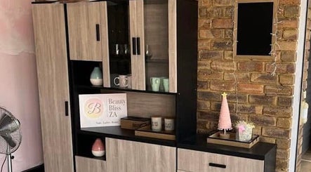 Modern wooden cabinet at Beauty Bliss ZA, Pretoria, Gauteng, ZA showcasing stylish decor elements.