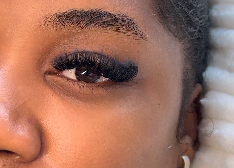 Close-up of eye with voluminous lashes at Lola Lashes, Southend-on-Sea, England, GB.