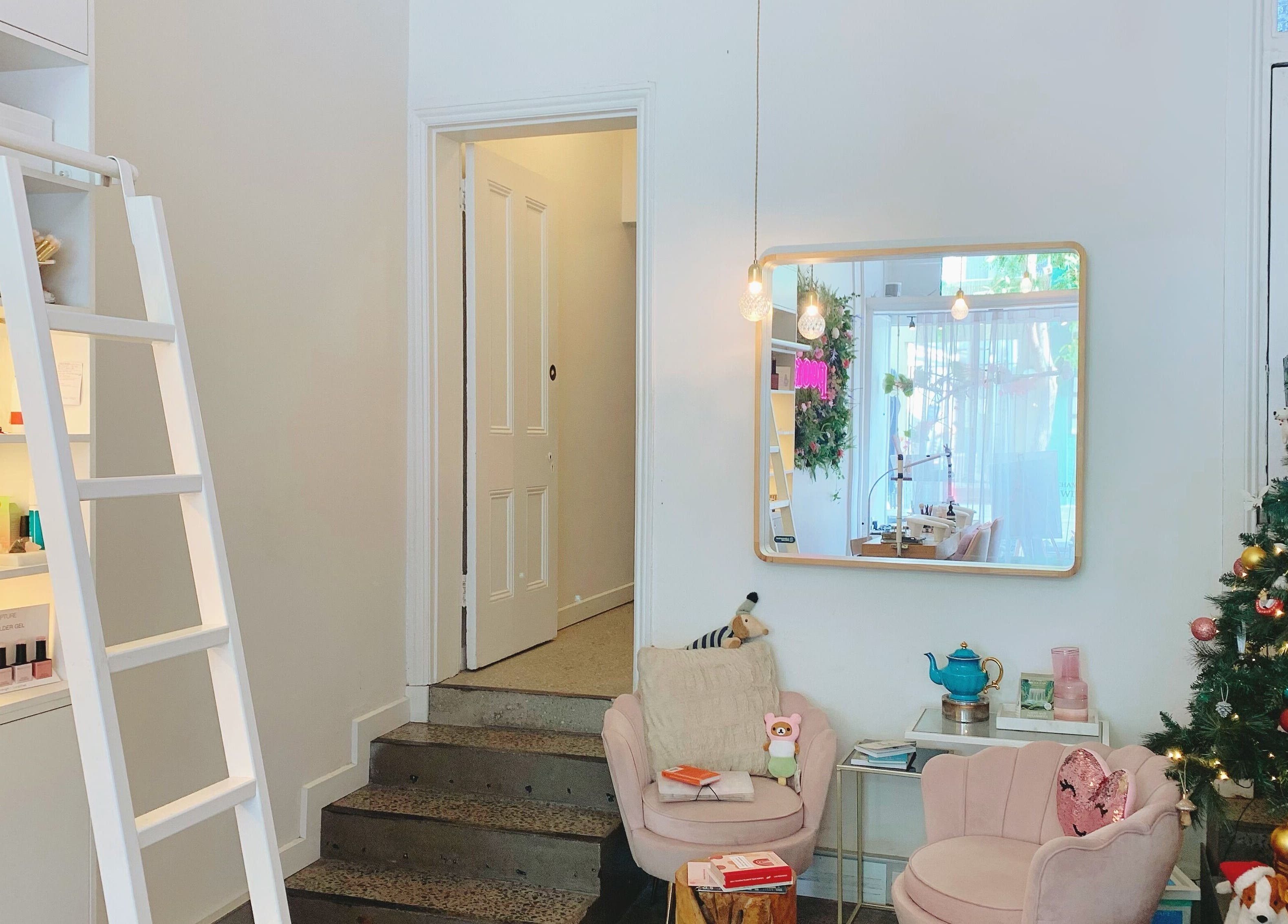 Inviting interior at Peony Beauty Melbourne, with festive decor in Prahran, Victoria, AU.