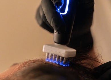 Close-up of a glowing scalp treatment at Elara, Glenside, South Australia, AU.
