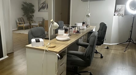 Modern nail salon at CK&Co Nails And Beauty, Lawnton, Queensland, AU showcasing sleek workstations and stylish decor.