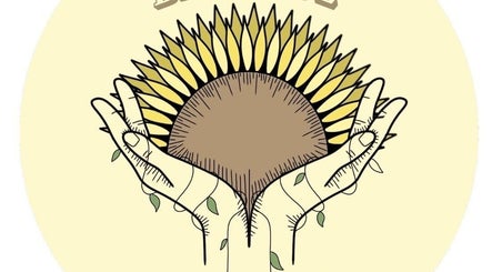 Illustration of hands holding a sunflower at Blissful Balance, Orem, Utah, US. Symbolizes harmony in wellness.
