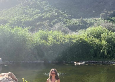 Scenic view at Blissful Balance in Orem, Utah, US, showcasing tranquil water and lush greenery.