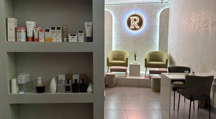 Rosewood Beauty lounge with elegant decor, Centurion, Gauteng, ZA, showcasing beauty products and cozy seating.