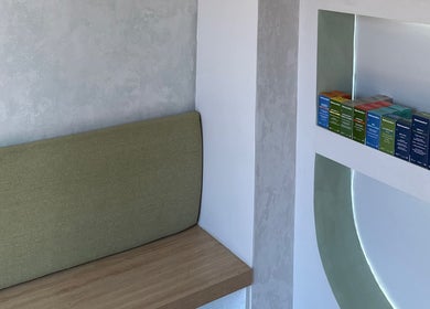 Cozy corner with skincare products at Rosewood Beauty, Centurion, Gauteng, ZA, offering a relaxing ambiance.