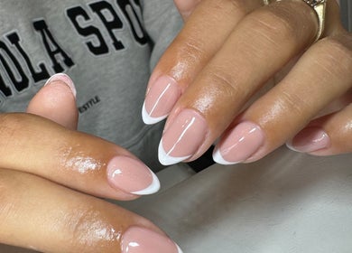 Elegant French manicure at Beauty By Ella in Tamworth, England, GB showcasing glossy and well-groomed nails.