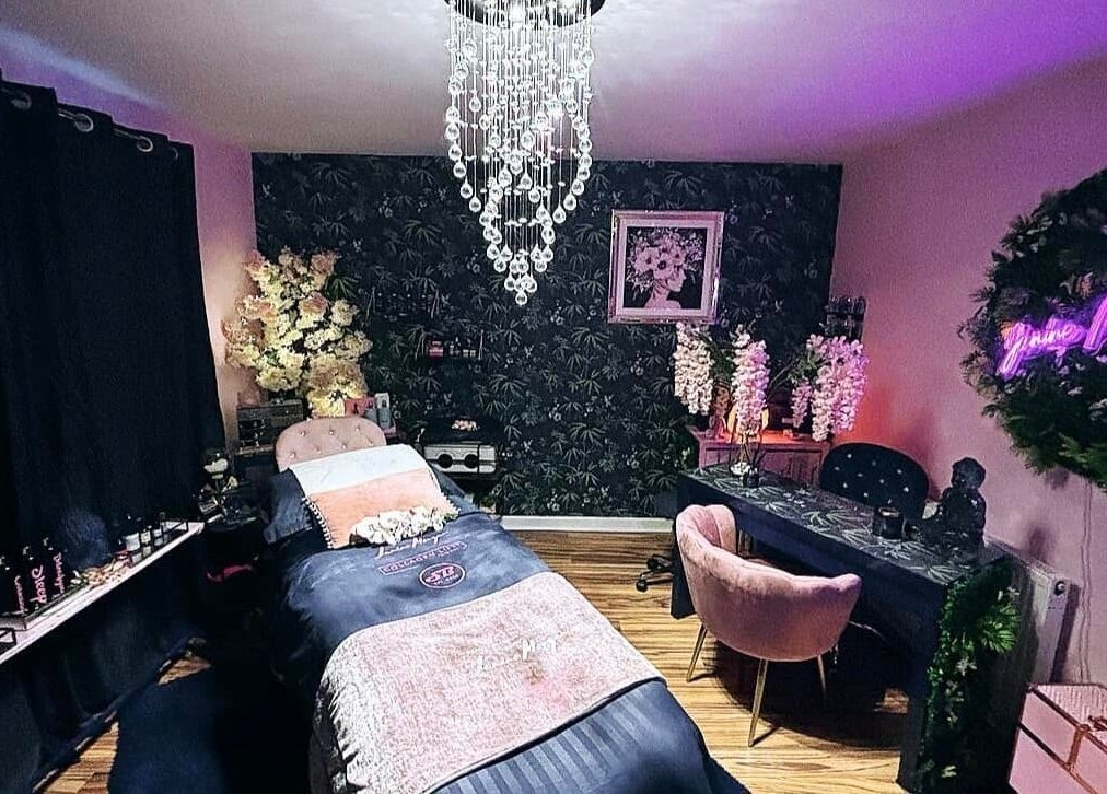 Chic and serene beauty room at Janine Morgan, Lytham St Annes, England, GB with elegant decor and plush seating.