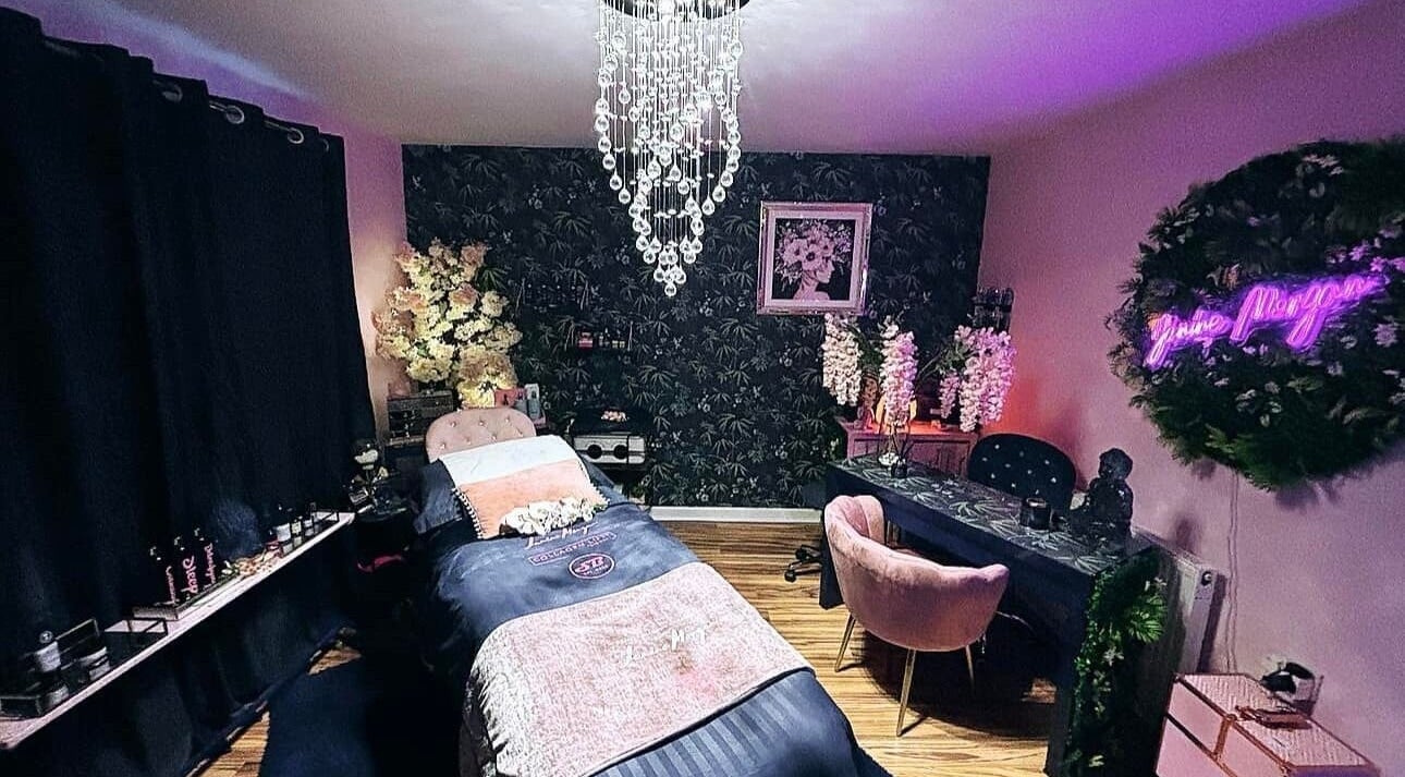 Chic and serene beauty room at Janine Morgan, Lytham St Annes, England, GB with elegant decor and plush seating.