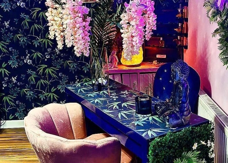 Elegant spa room at Janine Morgan, Lytham St Annes, England, GB, featuring floral decor and calming ambiance.