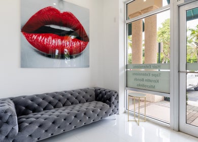 Elegant lobby with plush sofa at Beauty Locks Hair Extensions, North Miami Beach, Florida, US.
