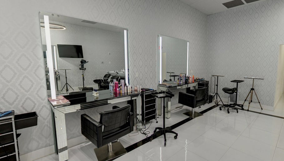Modern salon interior at Beauty Locks Hair Extensions, North Miami Beach, Florida, US with sleek styling stations.