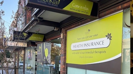 Exterior view of PhonKlai Thai Massage Toorak with green signage in Melbourne, Victoria, AU.