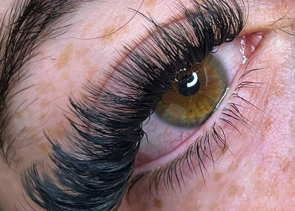 Close-up of expertly crafted eyelash extensions at Peak In Beauty, Combs, England, GB.