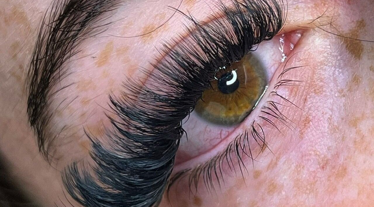 Close-up of expertly crafted eyelash extensions at Peak In Beauty, Combs, England, GB.