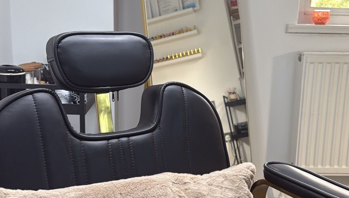 Luxurious salon chair at By Melissa Studio, East Kilbride, Scotland, GB, promising a relaxing beauty experience.