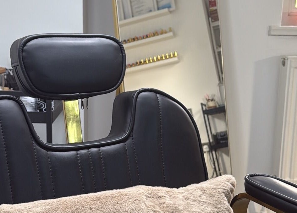 Luxurious salon chair at By Melissa Studio, East Kilbride, Scotland, GB, promising a relaxing beauty experience.