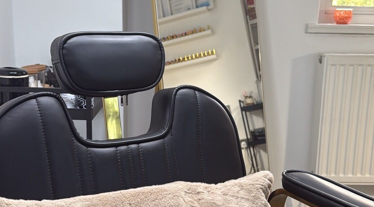 Luxurious salon chair at By Melissa Studio, East Kilbride, Scotland, GB, promising a relaxing beauty experience.