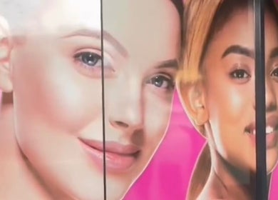 Colorful promotional display at SHIFT COSMETIC CLINIC in Gladesville, New South Wales showing radiant skin.