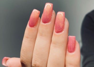 Stunning pink gradient manicure at Embracing Beauty, Iż-żejtun, MT. Perfect for a chic and polished look.