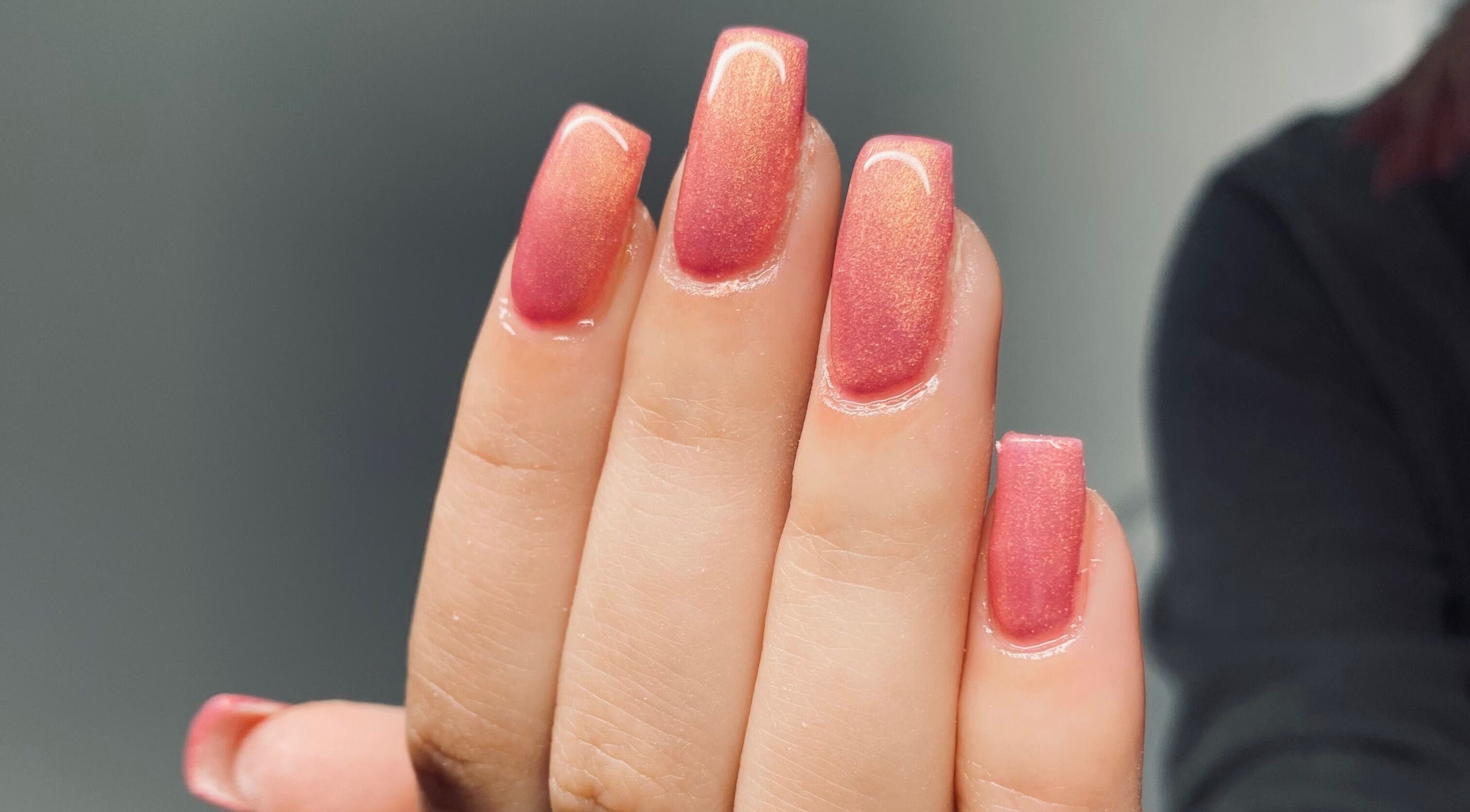 Elegant pink manicured nails at Embracing Beauty, Iż-żejtun, MT. Perfect for a sophisticated look.