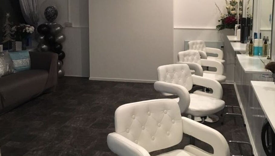 Modern styling chairs, Kelly Nolan Hairdresser, Barry, Wales, GB. Elegant salon interior decor.