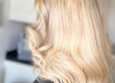 Blonde hair styled in waves at Kelly Nolan Hairdresser, Barry, Wales, GB.