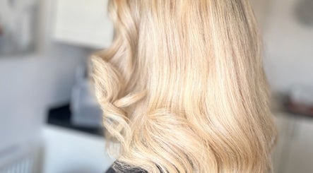 Blonde hair styled in waves at Kelly Nolan Hairdresser, Barry, Wales, GB.