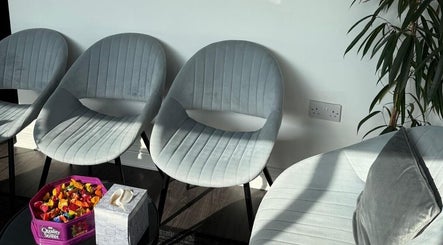 Comfortable seating area with modern chairs at The Recovery Room Oldham, Oldham, England, GB.